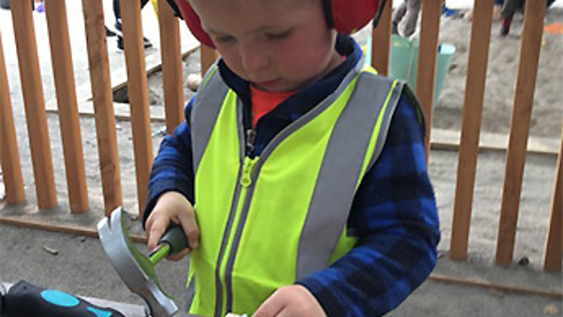 Child doing carpentry at Learning Adventures Levin childcare